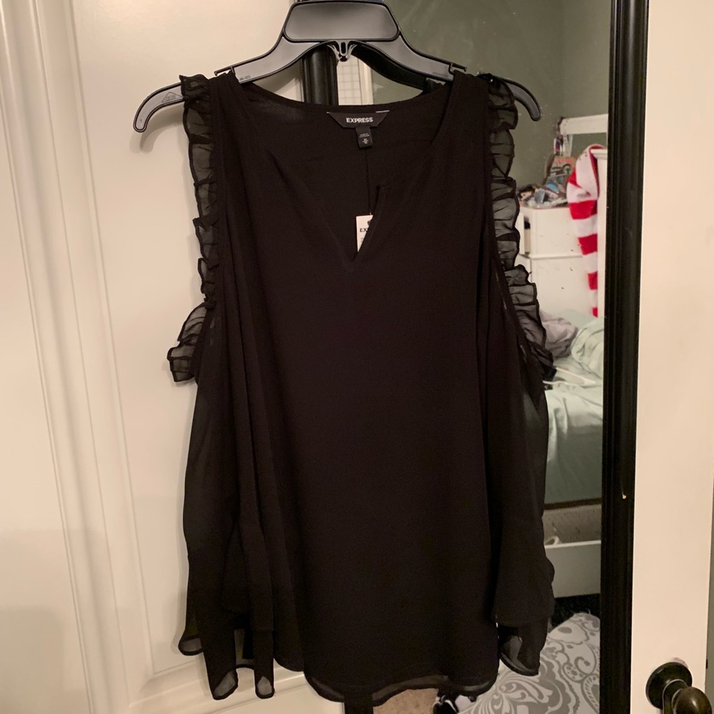 Very cute women’s open shoulder shirt